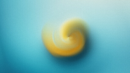 Abstract blurred image featuring a central yellow shape against a soft blue gradient background design art