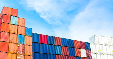 Fototapeta premium Cargo ship container goods export import international transport on blue sky background, warehouse industry business logistics transportation harbor port industrial shipping terminal cargo ship.