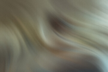 A close up blurry shot of a white dog with its nose and eyes visible in a soft focused image quality