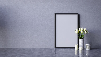 A minimalistic decor featuring a blank frame, white flowers in a vase, and candles against a textured gray wall. 3d rendering blank frame on wall for copy space advertising.