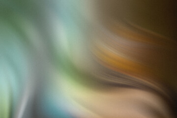 Abstract blurred background featuring shades of green, brown, and yellow creating a soft gradient effect