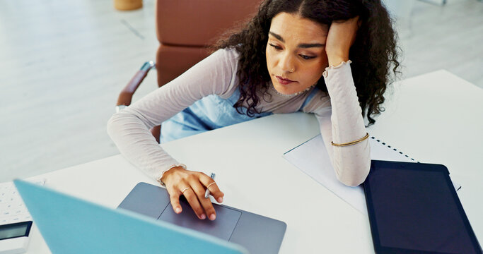 Business woman, bored and fatigue with laptop for burnout or insomnia at office desk. Tired, female person or lazy employee with computer or tasks for procrastination or sluggish day at workplace