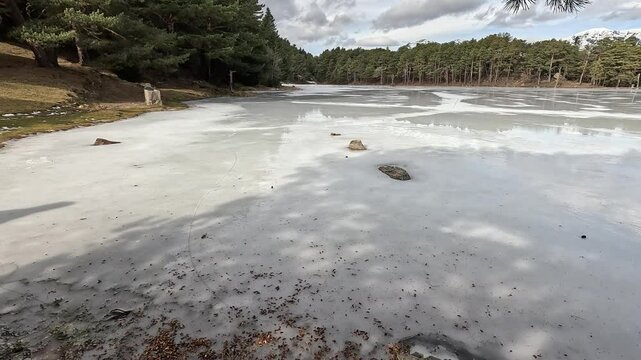 Bassa de oles, frozen pond in the Aran valley Pyrenees mountains in Lleida Catalonia Spain