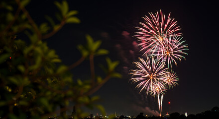 Spectacular Fireworks Display Over Cityscape at Night Perfect for Holiday Celebrations Festive Events and New Years Greetings