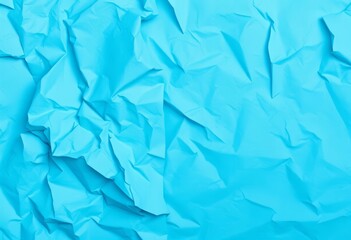 Obraz premium Close-up of crumpled blue paper texture on white, texture, recycled paper