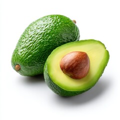 Close up of a whole and halved avocado