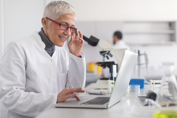 Senior female scientist working in laboratory
