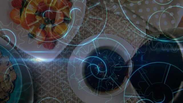 Overhead breakfast setup getting animated in 3D render showing coffee pouring and holographic gears