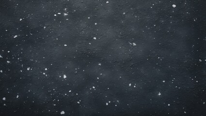 Abstract stone pattern with rugged, speckled texture on a dark concrete surface