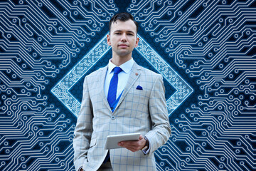 Trader man in suit holding digital tablet computer