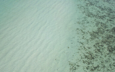 Aerial view of clear sea water and coral reef in Koh Kradan Island, Andaman sea