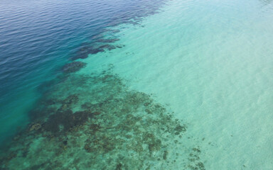 Aerial view of clear sea water and coral reef in Koh Kradan Island, Andaman sea
