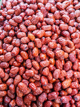 Close-up of fresh jujube fruits at a market in Singapore