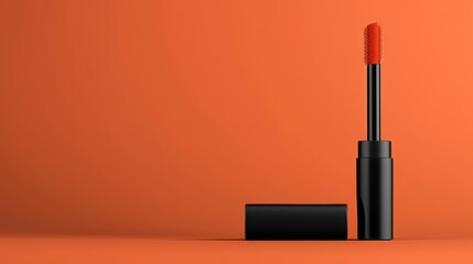 An open mascara applicator and tube on a bright orange background