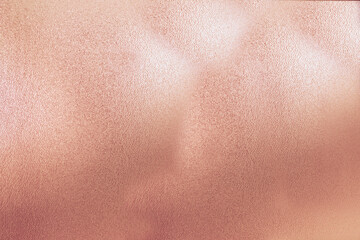 Rose gold background. Luxury shiny gold texture