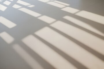 Minimalist white textured floor with soft shadows in natural light. Modern architectural detail with clean lines.