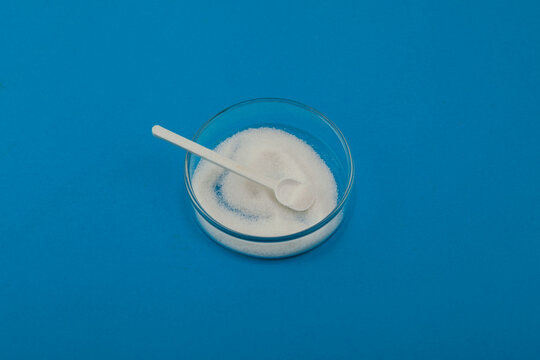 Nitrate of potash or Saltpetre in Petri dish. Saltpeter. Fertilizer. Potassium nitrate powder also used as food additive E252 in meat processing