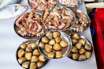 Fish market in Mumbai India, market stall with freshly caught seafood, fishing industry at the...