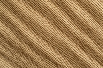 Fototapeta premium Beige, textured fabric with diagonal ridges