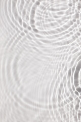 White water texture background on the noon sunlight.