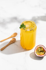 refreshing summer drink, pineapple juice with passion fruit