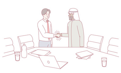 Two professionals shake hands, symbolizing their commitment to business cooperation and collaboration