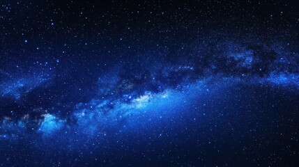 Obraz premium astronomical milky way expanse in deep blue night sky with scintillating cosmic particles creating dreamy stellar atmosphere in dark background