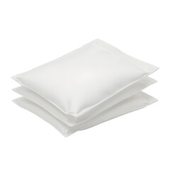 Stack of three white pillows stacked against plain background