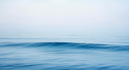 Obraz premium Soothing Minimalist Background Calm Ocean Waves Soft Blue White Gentle Water Texture Peaceful Sea Scene