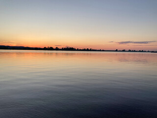 Fototapeta premium sunset over the river, mobile photography 