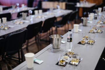 Gathering for a whiskey tasting event at a cozy venue with friends