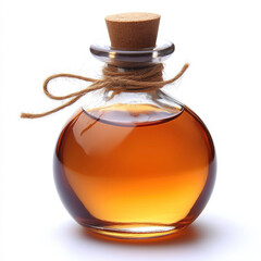 Round clear glass bottle with amber liquid and cork stopper...