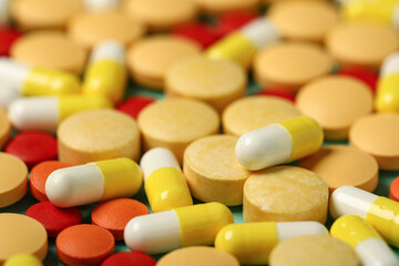Different pills as background, closeup