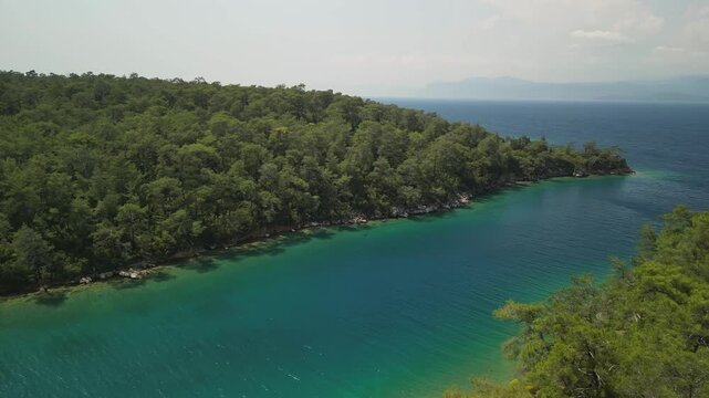Manual half-circle drone flight over Karaca bay in Turkey