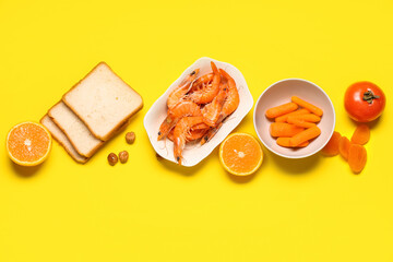 Different products on yellow background. Food Allergy Awareness Month