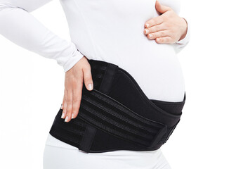 Comfortable pregnancy support belt worn by an expectant mother helping alleviate discomfort during the later stages of pregnancy