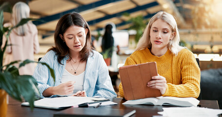 College, teamwork and students with tablet, classroom and discussion for assignment, online and thinking. University, women and studying with tech for exam, knowledge and people with scholarship