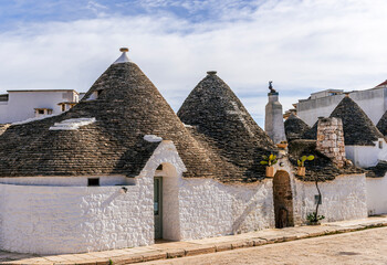 beautiful fancy buildings trulli in Puglia , Italy. Fantastic italian architecture with old houses...