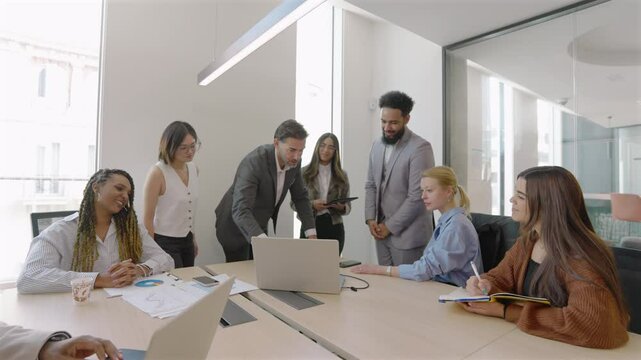 Highly skilled and experienced business diverse team is convening a meeting to thoroughly analyze financial data, systematically review sales reports, and thoughtfully assess current market trends  - Powered by Adobe