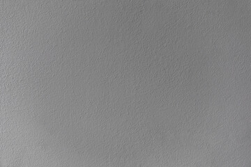 painted wall forming a textured gray background