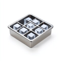 Ice cubes in metal tray, close up on white background