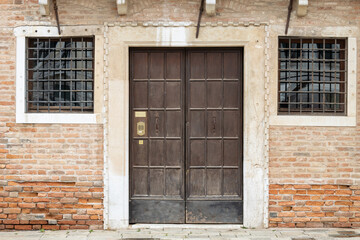 Rustic Wooden Door with Grilled Windows