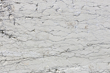 Smooth White Rock Surface with Fine Cracks