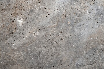 Warm gray stone texture displays subtle speckles and a flat surface, ideal for backgrounds and design elements.