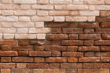 Contrast of Painted and Exposed Brick Wall
