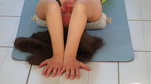 young woman doing yoga