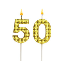 Burning gold birthday candles isolated on white background, number 50.	
