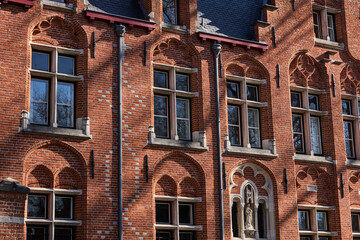 historic red brick building in downtown brugge belgium
