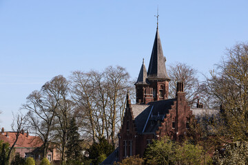 historic red brick building in downtown brugge belgium