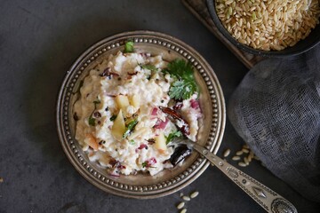 Yogurt or Curd rice with brown rice, selective focus